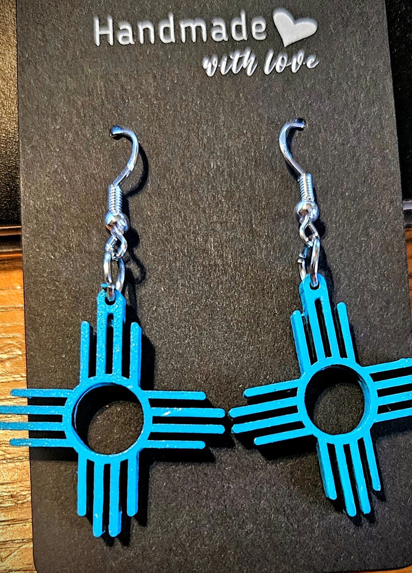Zia Earrings with circle center.